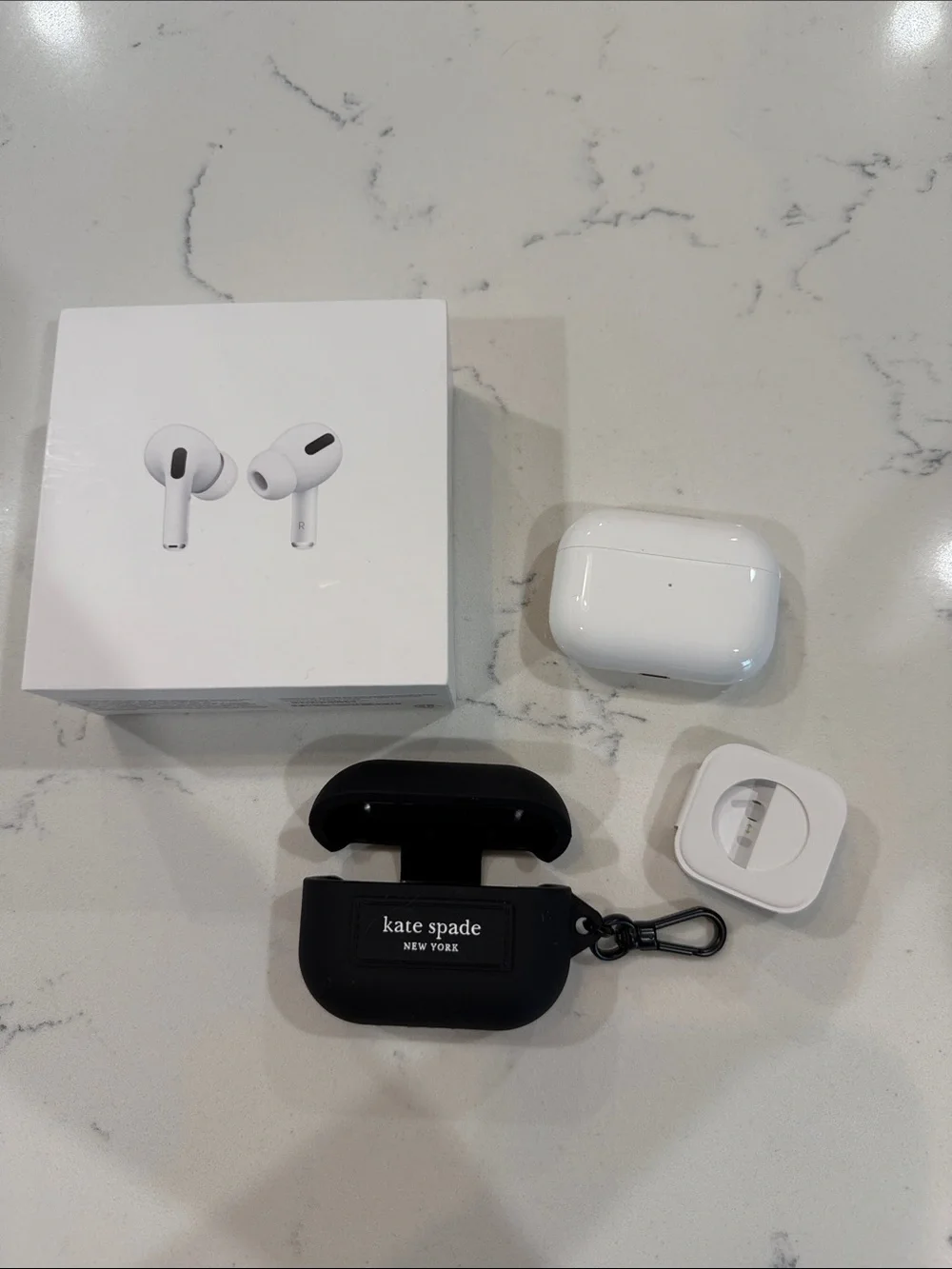 Apple AirPods Pro with MagSafe Charging Case + Kate Spade Black Silicone Case